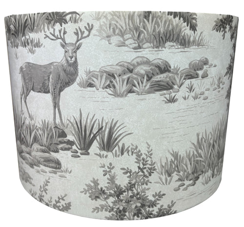Grey stag and deer lampshade with woodland design.