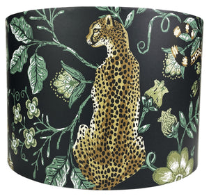 Cheetah lampshade featuring exotic jungle design with green floral leaves on black background.