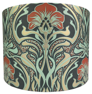 Art Nouveau lampshade in drum style featuring blue, green, and orange floral patterns.