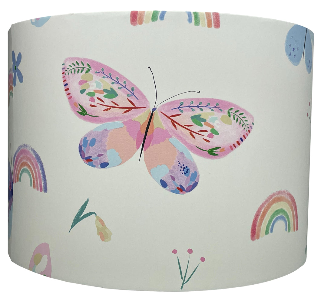 Pastel butterfly and rainbow lampshade for girls' bedroom decor.