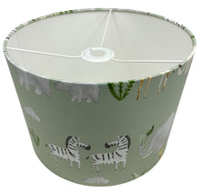 Load image into Gallery viewer, Jungle themed lampshade with safari animals, perfect for a bedroom or nursery decor.