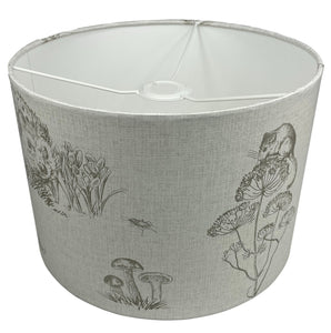 Whimsical lampshade featuring rustic woodland animals for versatile lighting.