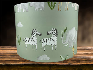 Ceiling or table light shade with jungle safari animal designs for kids bedrooms.