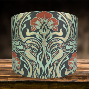  Art Nouveau lampshade with vibrant blue, green, and orange design.
