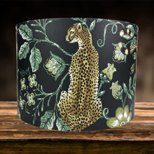 Load image into Gallery viewer, Handcrafted lampshade with bold cheetah and lush green foliage design for jungle-themed decor.
